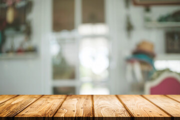 Empty wooden table space platform and blurred restaurant or coffee shop background for product display montage.