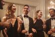© Jacob Lund - Group of friends celebrating at a nightclub