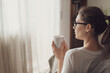 © stokkete - Woman relaxing and having a coffee break