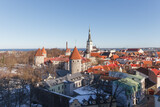 Fototapeta Dziecięca - Bright colourful aerial view of old town of Tallinn, Estonia at sunny day. Beautiful roof tops.
