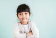 © Asada - Portrait of Asian little child student  girl smiling to the camera.