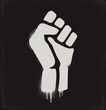 Fist raised in protest. Fist icon isolated on a dark background. Vector illustration