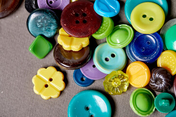 Poster - Background and texture of multicolored antique buttons