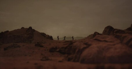 Wall Mural - wide dolly in three astronauts walking on a surface of a red rocky planet. mars colonization concept