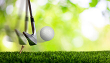 Slow Motion Of Golf Club Hitting Golf Ball On Tee.