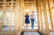 © leszekglasner - Loving couple at construction site of their new home dreams come true