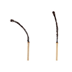 two burnt matches closeup on a white background. isolated blank for design.