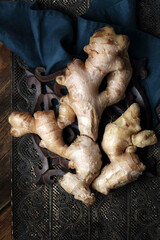 Fresh raw ginger on a metal tray