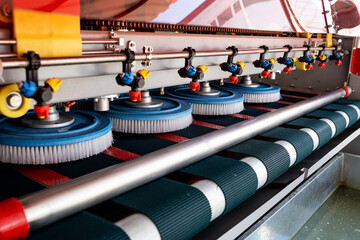 Automatic washing and cleaning of carpets. Industrial line for washing carpets