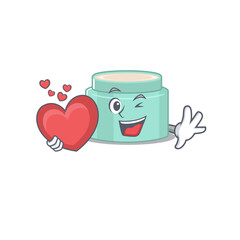 Canvas Print - A sweet lipbalm cartoon character style holding a big heart