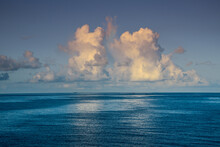 Blue Sky, Beautiful Clouds, Blue Ocean At Early Evening Sunset Time In Tropical Islands In Indian Ocean In Maldives.