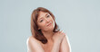 © Svyatoslav Lypynskyy - Sexy mature woman with naked shoulders looks at camera touching shoulder with hand. Body care concept. Blank for ad banner.