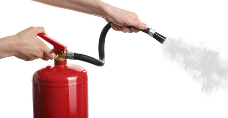 Woman using fire extinguisher on white background, closeup