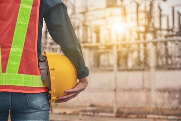 Women Engineer holding helmet hard hat factory industrial businesses