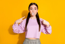 Portrait Of Shocked Excited Youth Girl Chewing Bubble Gum Blowing Impressed Point Index Finger Wear Good Look Pullover Isolated Over Vibrant Color Background