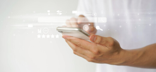 Wall Mural - close up man hand touchscreen on smartphone to use search engine optimization (seo) tools for find c
