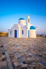 Cyprus. Protaras. Church of St. Nicholas in Cyprus. The Port Of Paralimni. Pernera. Blue and white Church on the coast of the Mediterranean sea. Attractions Of Cyprus. 