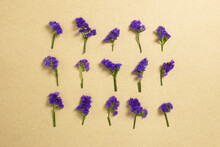 Purple Statice Flowers On Kraft Paper Background. Floral Composition, Flat Lay, Top View, Copy Space