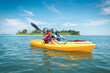 © romylee - father and son kayakers paddling in the Long Island Sound