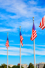 It's American National flags at the Washington Monument, an obelisk on the National Mall in Washington, D.C. U.S. National Register of Historic Places