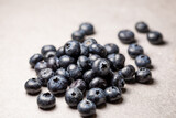 Fototapeta Tulipany - Blueberries sitting on countertop