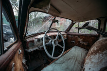 Retro Car Interior. Steering Wheel Of Abandoned Rusty Old Car