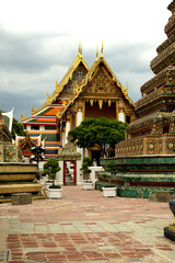 Wall Mural - Thai classic church on gray cloudy sky