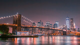 Fototapeta  - Brooklyn bridge and manhattan at night