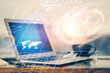 © peshkova - Double exposure of desktop computer and technology theme hologram. Concept of software development.