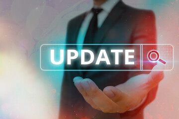 Wall Mural - writing note showing update. business concept for up to date as by adding new information or making 