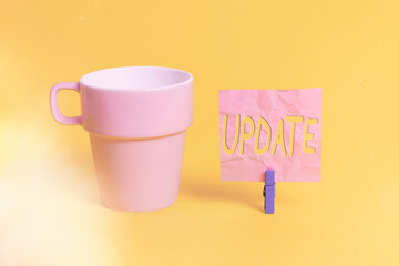 Wall Mural - text sign showing update. business photo showcasing up to date as by adding new information or makin