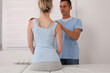 © dream@do - Scoliosis, Posture Correction. Chiropractic treatment, Back pain relief. Physiotherapy for female patient