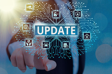 Wall Mural - writing note showing update. business concept for up to date as by adding new information or making 