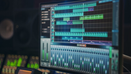Fototapete - Modern Music Recording Studio Equipment: Computer Screen Showing User Interface of DAW Digital Audio Workstation Software with Track Song Playing. Sound and Music Recording and Editing Application