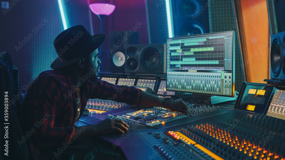 Stylish Audio Engineer / Producer Working in Music Record Studio ...