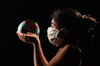 © AALA_IMAGES - A kid with soap bubble _wearing mask