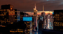 Times Square, Midtown Manhattan, New York Skyline At Night