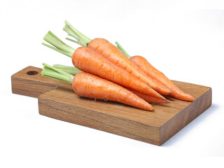 Carrots on white background.Carrot on wooden cutting board.