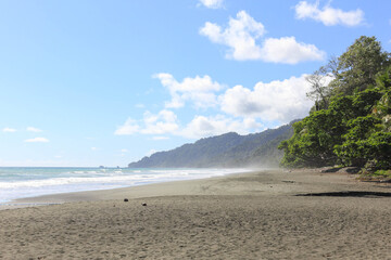 Beautiful beach scenery in Corcovado National Par, summer and waves, Costa Rica, Central America