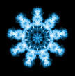 Snowflake pattern isolated on black background. X ray effect.