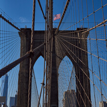 Brooklyn- Bridge- Flag- American- Architecture- Manhattan- New York City- United States- USA.