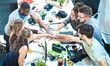 © Mirko Vitali - Young employee startup workers group stacking hands at urban studio during entrepreneurship brainstorming project - Business concept of human resources on working time - Start up internship at office