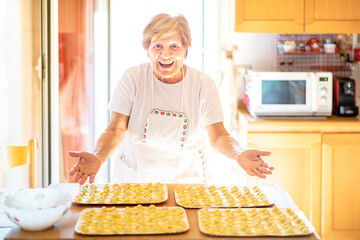 Happy woman presenting handmade 