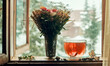 Tea cup with tea leaves on window. Tea time.