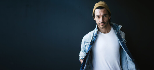 Handsome guy dressed in blank white t-shirt