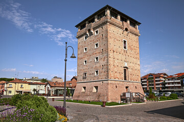 Wall Mural - Cervia, Ravenna, Emilia-Romagna, Italy: the ancient Saint Michael tower on the canal port of the town