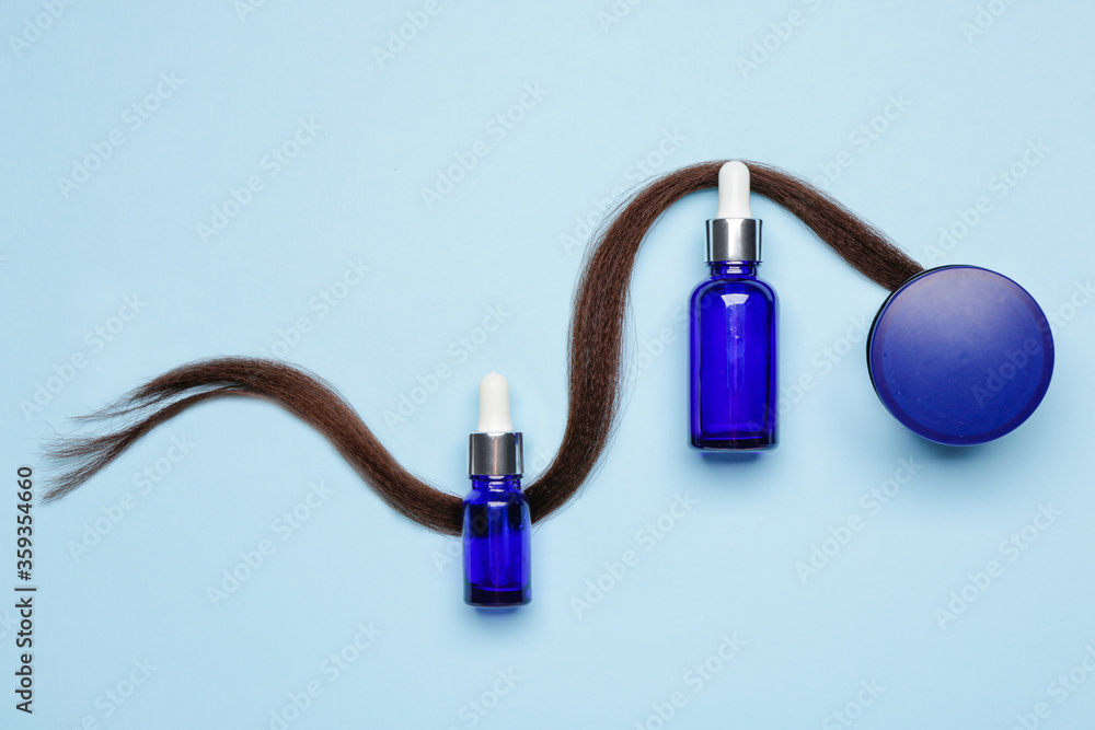 Set for hair treatment on color background
