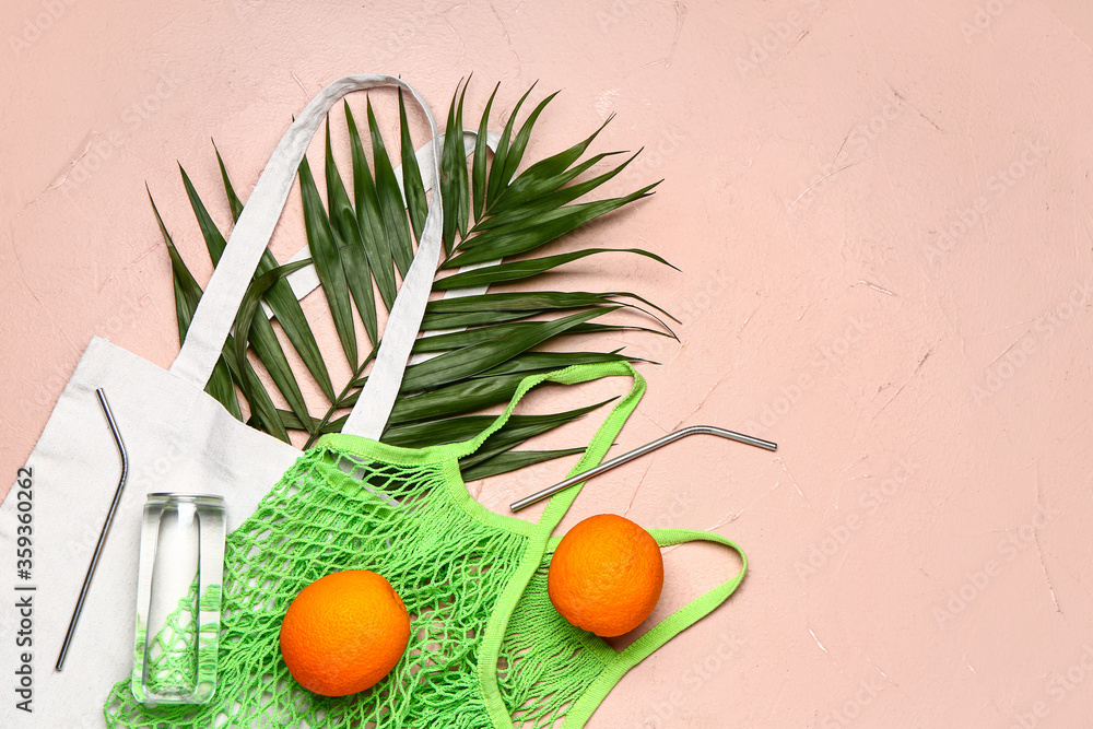 Composition with eco bags on color background