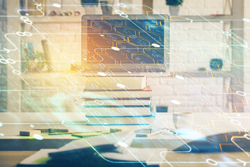 multi exposure of desktop computer and technology theme hologram. concept of software development.