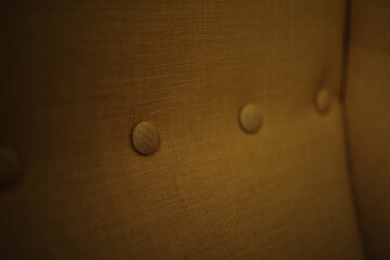 Buttons on armchairs and sofas, the use of buttons in decorating objects